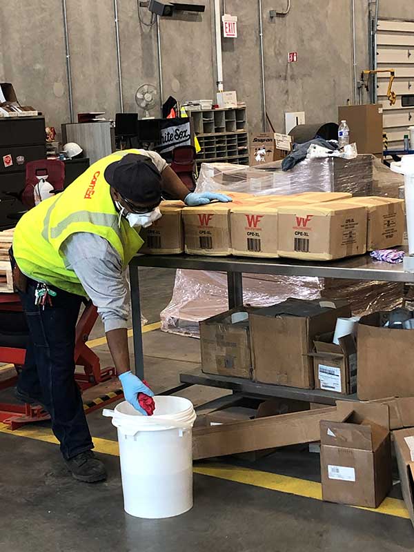 ComEd Employee Wiping Boxes