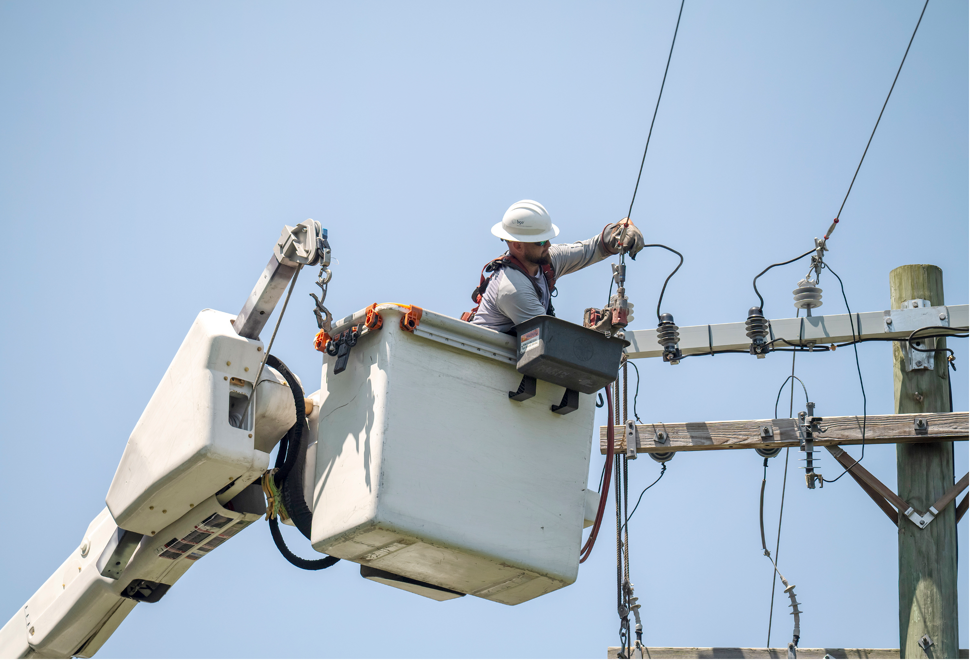 lineworker working on electric cables