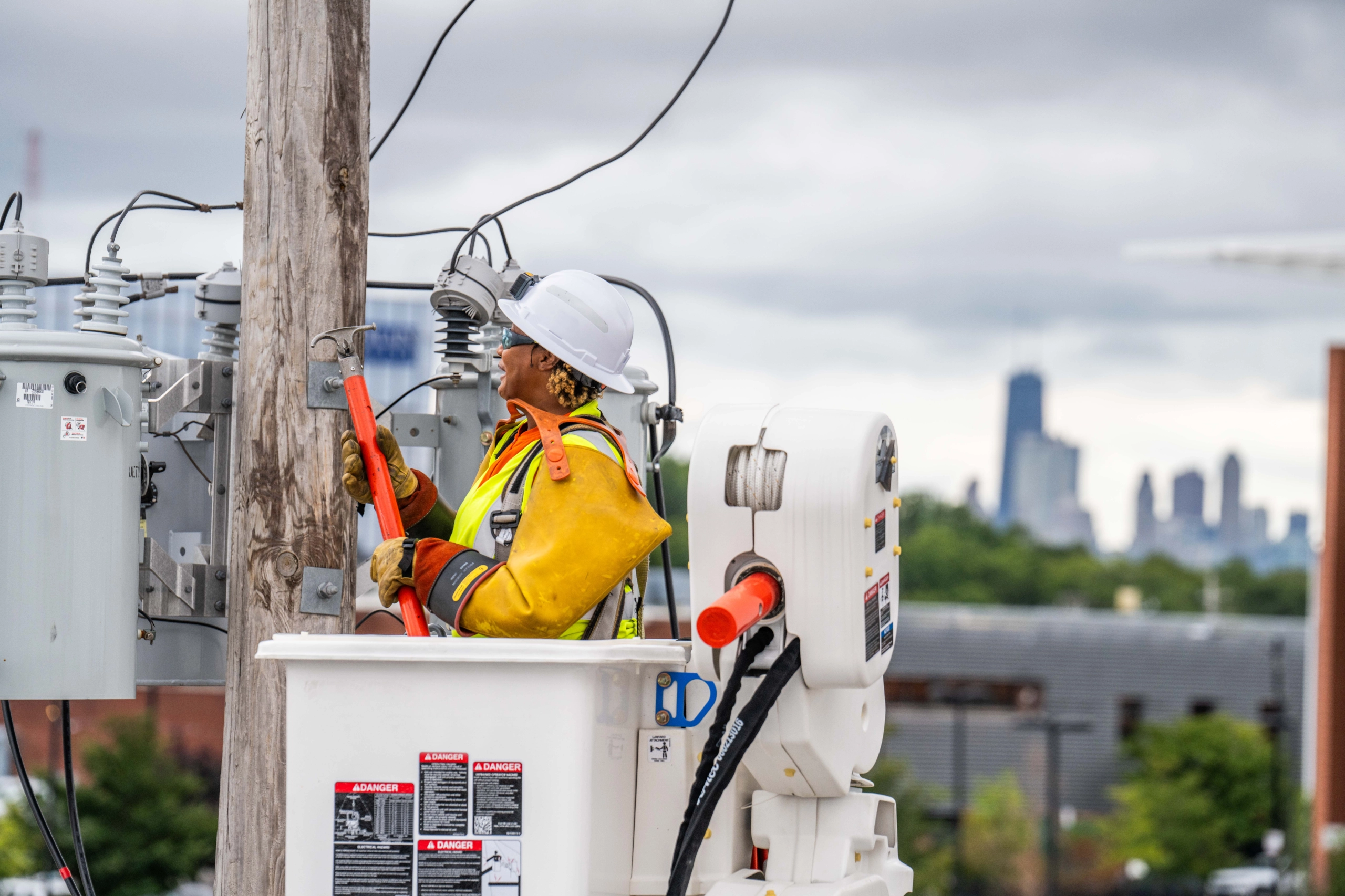 lineworker working on electric cables